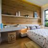 MIA Design Studio將越南的房屋蓋在植物覆蓋的墻壁和庭院中