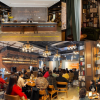 體驗(yàn)雅致沙龍盛宴，走進(jìn)喆啡酒店咖啡館文化酒店主題